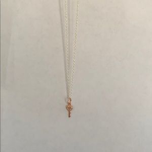Rose gold and silver key necklace with small gems